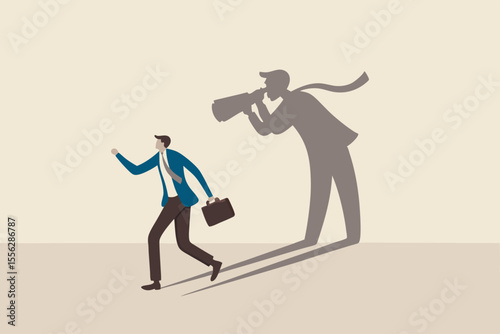 Internet stalker, espionage, online advertising tracking and follow users, spyware, safety, security and privacy issue concept, businessman walking with shadow using spyglass binocular stalking him.
