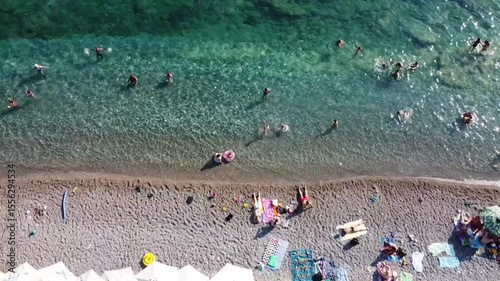 aerial view of the beach with bathers in the water, Adriatic see, Montenegro beach Buljarice