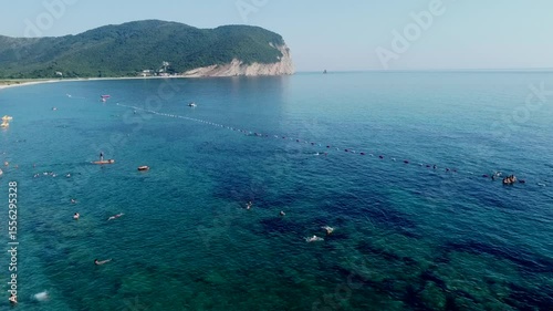 aerial view of the beach with bathers in the water, Adriatic see, Montenegro beach Buljarice