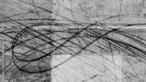 Aerial view car tire marks abstract street road background with black tire marks on race track, Texture and background car automobile and automotive skid tire marks.