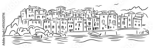coastal town with buildings on rocky cliff