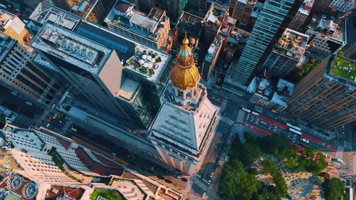 View on the pyramidal gilded roof containing a cupola and lantern. Drone flight over the clock tower of Metropolitan Life Insurance Company. New York, USA.
