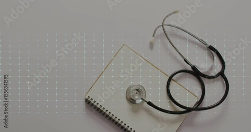 Glowing ECG line emerging from left spiking thrice behind stethoscope on notebook showing heartbeat