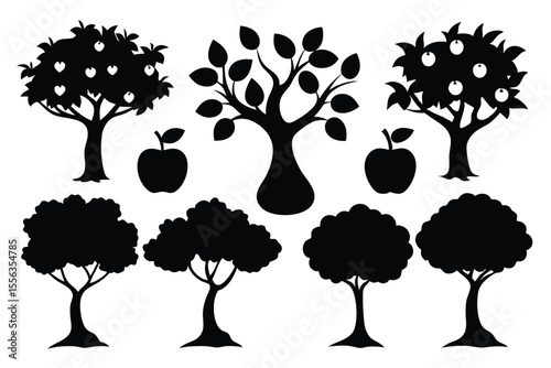 Black silhouettes of apple trees and apples isolated on white