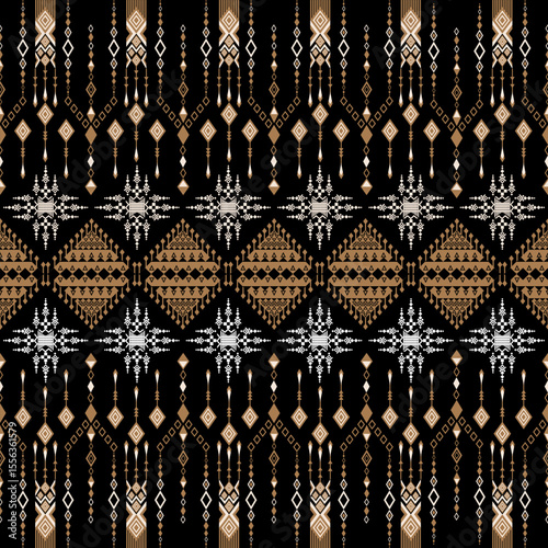 Geometric pattern in black, white, and gold.
