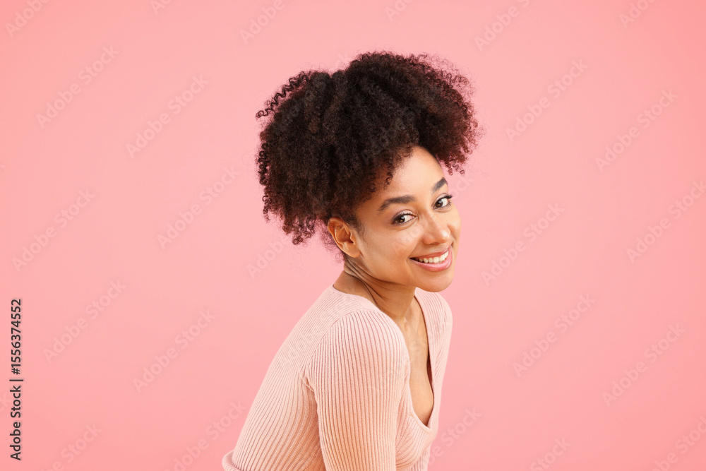 Portrait of beautiful Brazilian woman on pink background Portrait of beautiful Brazilian woman on pink background