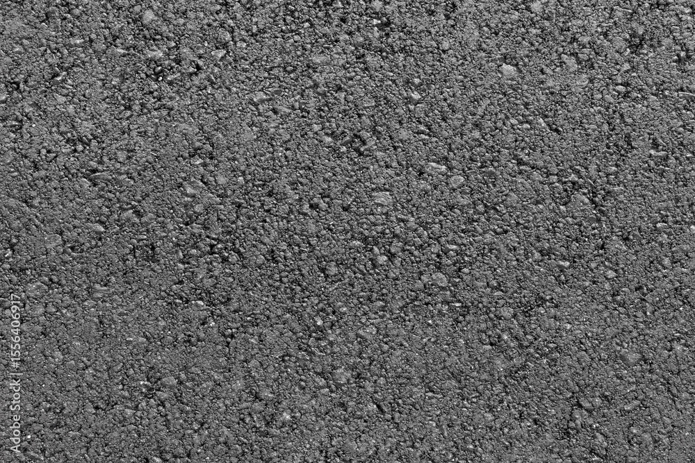 Fototapeta premium Black asphalt road texture background. Top view close-up. Copy space.