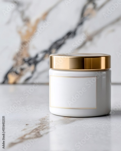 White cosmetic jar with golden lid on marble countertop, beauty product packaging mockup