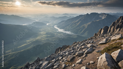 Lone Hiker Standing on Rugged Rocky Summit Overlooking an Endless Misty Valley for Adventure Tourism Commercials, Outdoor Lifestyle Branding, and Motivational Nature Campaigns