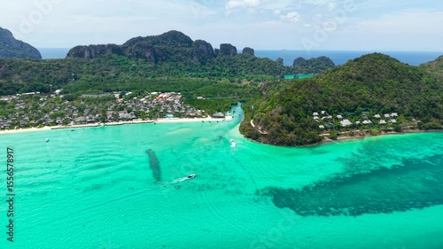 Luxury hotel on the coast of Phi Phi island. Turquoise lagoon on the shore, view from a great height on the coast of popular Thai islands.