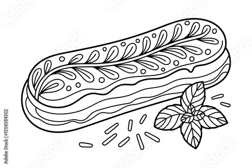 Ornate pastry, decorated with floral designs, and mint leaf.
