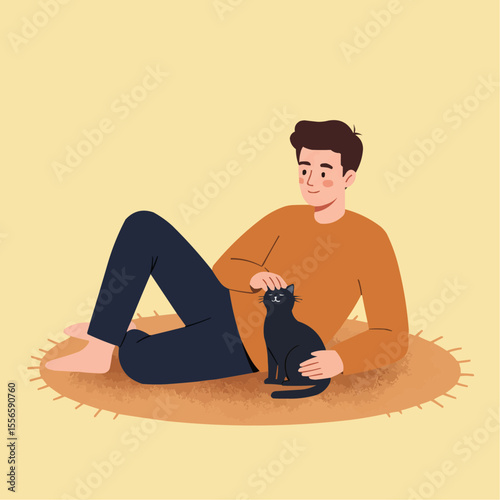 Young man sitting on floor and petting black cat at home  