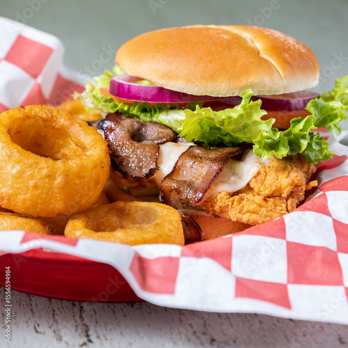 Fried chicken sandwich with onion rings
