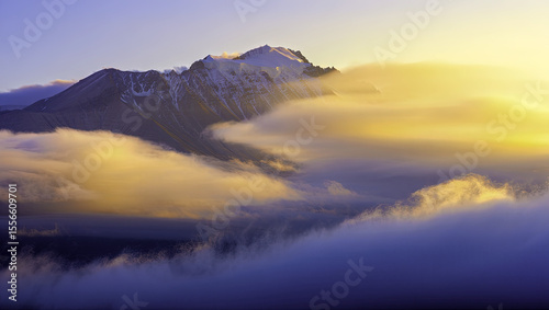 Mountain landscape with clouds at sunset