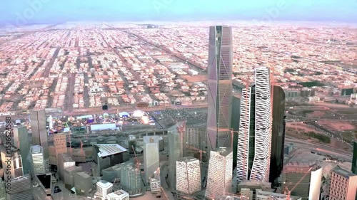 Stunning 4K aerial drone footage of Riyadh city, highlighting the famous Al Faisaliah Tower, modern skyline, urban architecture, and iconic landmarks of the Saudi capital. Captured on January 10, 2024
