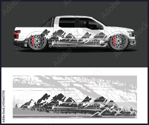Custom Truck with Mountain Graphic Wrap and Lowered Suspension Design