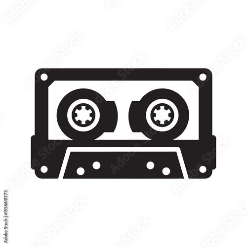 Solid glyph vector icon of a vintage audio cassette tape representing retro 80s music and old analog sound recording media technology