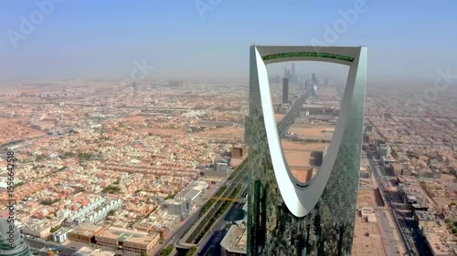 Stunning 4K aerial drone footage of Riyadh city, highlighting the famous Al Faisaliah Tower, modern skyline, urban architecture, and iconic landmarks of the Saudi capital. Captured on January 10, 2024