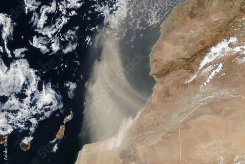 A vast Saharan dust plume drifts from Morocco over the Atlantic Ocean, visible from orbit. Image courtesy of NASA
