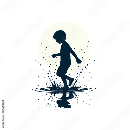 A playful boy splashing in a puddle