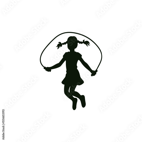 Girl with pigtails jumping rope