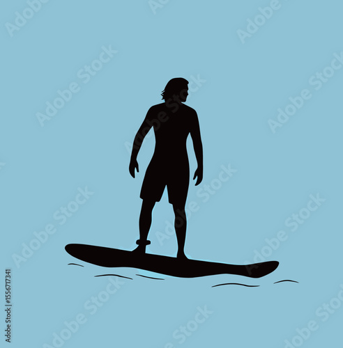 Silhouette of a male surfer riding a wave against a blue backdrop.