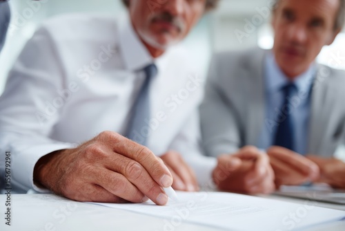 Business team discussing project plans around a table