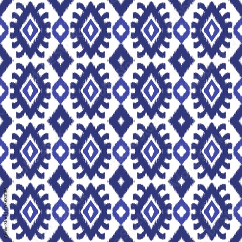 Geometric and symmetrical pattern featuring diamond shapes in deep blue on a white background. 