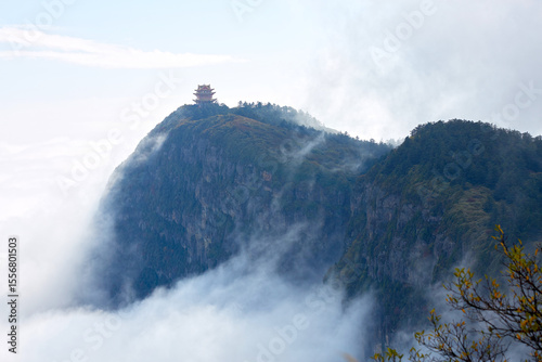 Obraz na plátně The Wanfo Summit of Mount Emei in Sichuan, China, emerging from a sea of clouds