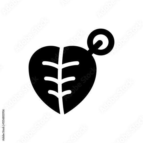 Illustration of a black and white bitter melon with a cross shape in the center and a small stem top left