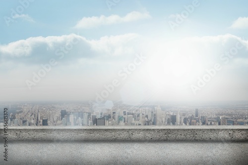 Fotografi Flat design rooftop showing concrete ledge overlooking city skyline with sun cas
