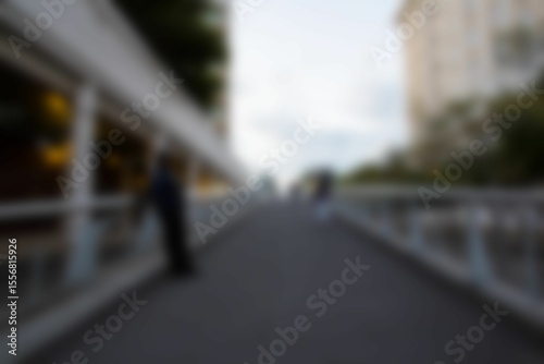 Person standing on footbridge