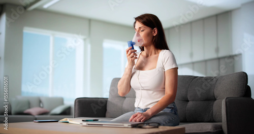 Female Patient Using Oxygen Mask For COPD Treatment