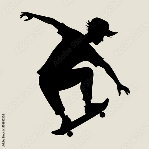 Silhouette of a skateboarder performing a trick on a skateboard