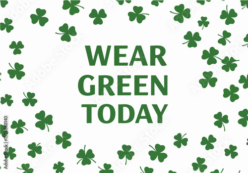Wear Green Today message with scattered shamrocks on a white background, perfect for St. Patrick's Day celebrations.