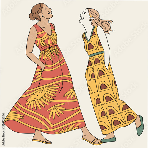 Two women laughing in patterned dresses boho fashion