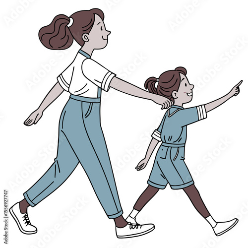 Sisters walking together pointing at something matching outfits