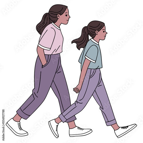 Two girls walking together in matching outfits sisters