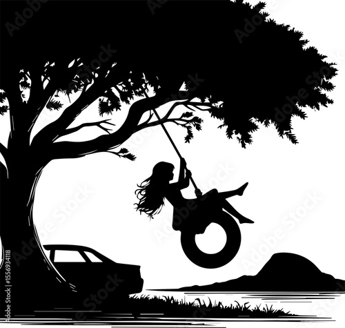 Girl swinging on tire swing under tree by lake in silhouette  