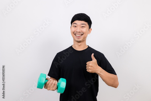 positive asian man black shirt work out with dumbbell show thumb up isolated