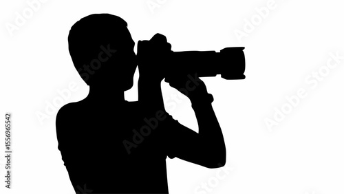 Silhouette of a photographer holding a camera and taking a picture in a white background scene view