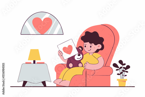 A child with a plush toy holding an emotion flashcard with a heart symbol, sitting in a cozy chair
