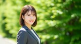 スーツを着用した女性のプロフィール写真