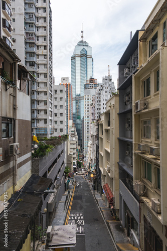 View of Peel street, scyscrapers, people and transport, Hong Kong. Vertical photo. 16 May 2025 - Hong Kong, China
