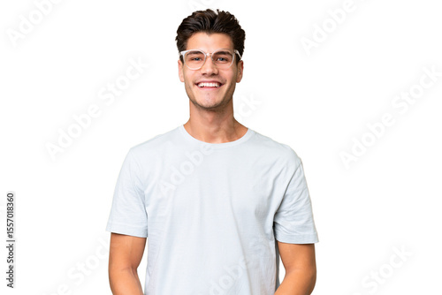 Young caucasian handsome man over isolated background laughing