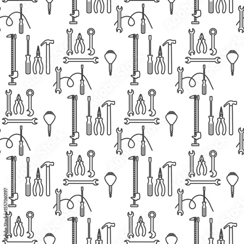 Tool pattern background with various hand tools arranged in seamless black and white design