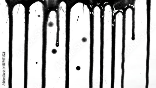 Abstract black paint drips down a white canvas, creating a striking contrast and artistic expression, suitable for modern art backgrounds