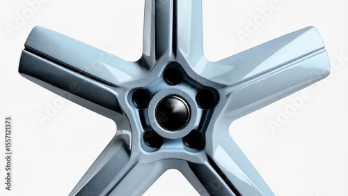 Close up five spoke powder blue wheel rim with dark lug nuts on white studio background showcasing modern automotive engineering