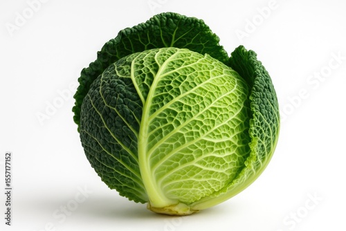 Detailed view of a two-tone green mature cabbage from behind on a white surface, showcasing it as a healthy cooking ingredient.