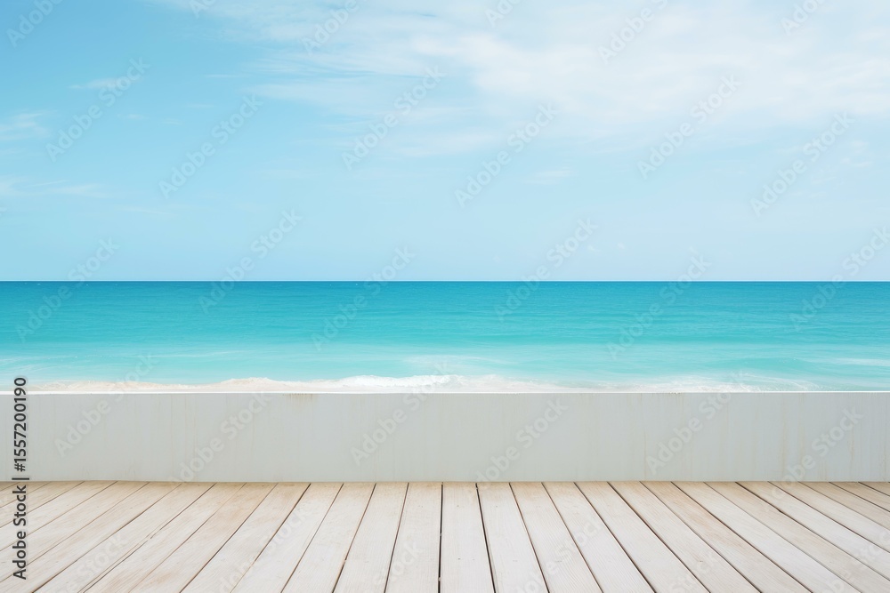 Fototapeta premium Wooden pier overlooking beautiful turquoise ocean and clear blue sky, perfect background for summer vacation and travel concepts